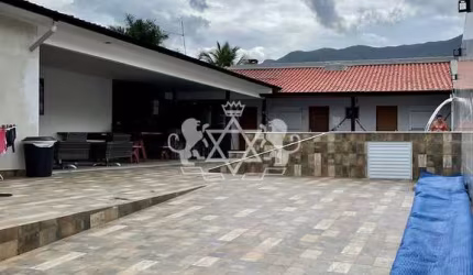Casa com 4 suítes + piscina à venda, no Portal do Patrimonium, em Massaguaçu Caraguatatuba , Litora
