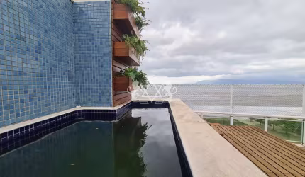 Cobertura duplex frente mar com piscina privativa e 3 vagas na garagem no bairro Aruan em Caraguata
