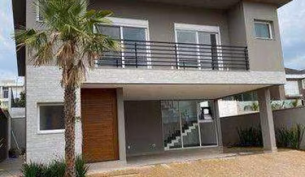 CASA EM CONDOMÍNIO 4 DORMITÓRIOS (390m²),4 SUITES, 4 VAGAS. UM SHOW DE CASA, NOVINHA
