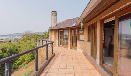 Casa com 4 quartos à venda na Praça Doutor Baltazar de Bem, 128, Vila Jardim, Porto Alegre por R$ 1.360.000