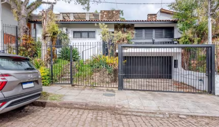 Casa com 4 quartos à venda na Rua Professor Fernando Carneiro, 102, Três Figueiras, Porto Alegre por R$ 1.250.000