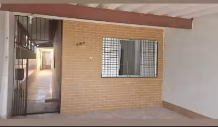 Linda Casa à venda em Praia Grande-SP, bairro Caiçara: 2 quartos, 1 sala, 2 banheiros, 2 vagas de garagem, 70 m².