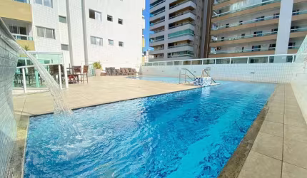 Apartamento à venda na Guilhermina, Praia Grande-SP: 2 quartos, 1 suíte, 2 salas, 2 banheiros, 1 vaga de garagem, 79m² de área. Venha conferir!