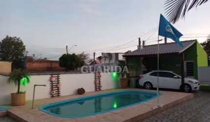 Casa com 3 quartos à venda na Rua F, 3681, Restinga, Porto Alegre por R$ 297.000