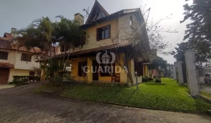 Casa em condomínio fechado com 3 quartos à venda na Rua Luís Felipe Monmany, 101, Espírito Santo, Porto Alegre por R$ 565.000