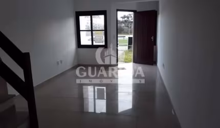 Casa com 3 quartos à venda na Rua Francisco Solano Borges, 92, Hípica, Porto Alegre por R$ 490.000