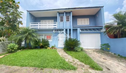 Casa com 3 quartos à venda na Rua Selso Maffessoni, 85, Ipanema, Porto Alegre por R$ 990.000