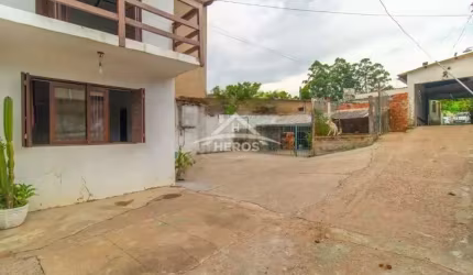Casa com 3 quartos à venda na Rua Amábile Samarani Ferreira, 428, Campo Novo, Porto Alegre por R$ 690.000