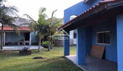 Casa com 4 quartos à venda na Santos Dumont, 3257, Centro, Tramandaí por R$ 450.000