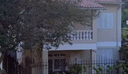 Casa com 3 quartos à venda na Avenida da Cavalhada, 6227, Cavalhada, Porto Alegre por R$ 577.000