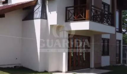 Casa com 3 quartos à venda na Estrada das Furnas, 706, Vila Nova, Porto Alegre por R$ 1.350.000
