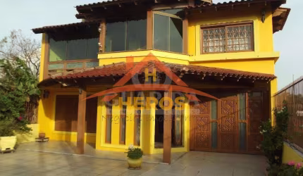 Casa com 4 quartos à venda na Rua Marquês do Maricá, 505, Vila Nova, Porto Alegre por R$ 795.000