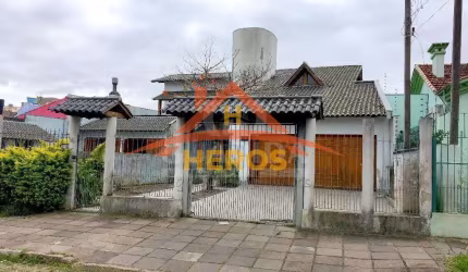 Casa com 4 quartos à venda na Rua Alfredo Silveira Dias, 36, Nonoai, Porto Alegre por R$ 980.000