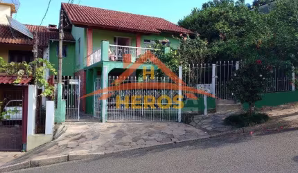 Casa com 2 quartos à venda na Rua Ângelo Passuelo, 100, Vila Nova, Porto Alegre por R$ 460.000