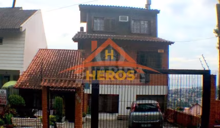 Casa com 4 quartos à venda na Rua Fernando Osório, 740, Teresópolis, Porto Alegre por R$ 780.000