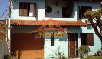Casa em condomínio fechado com 5 quartos à venda na Avenida Edgar Pires de Castro, 1100, Aberta dos Morros, Porto Alegre por R$ 550.000