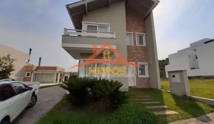 Casa em condomínio fechado com 3 quartos à venda na Avenida Edgar Pires de Castro, 540, Aberta dos Morros, Porto Alegre por R$ 1.500.000