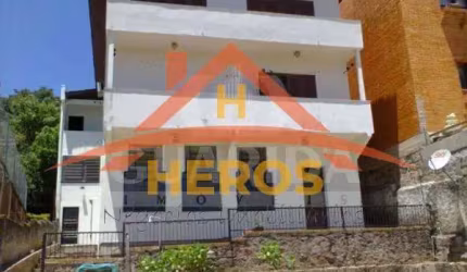 Casa em condomínio fechado com 4 quartos à venda na Praça São Caetano, 84, Teresópolis, Porto Alegre por R$ 1.490.000