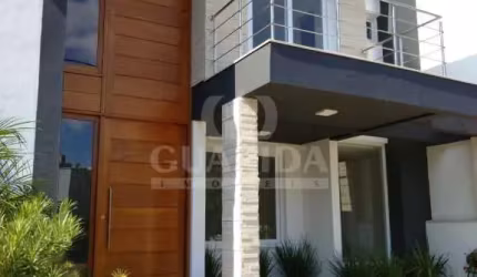 Casa em condomínio fechado com 3 quartos à venda na Rua Carlos Maximiliano Fayet, 300, Hípica, Porto Alegre por R$ 742.000