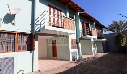 Casa em condomínio fechado com 3 quartos à venda na Rua São Sebastião do Cai, 119, Camaquã, Porto Alegre por R$ 379.000