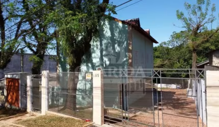 Casa em condomínio fechado com 3 quartos à venda na Rua Prisma, 185, Santa Tereza, Porto Alegre por R$ 210.000