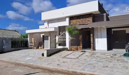 Casa em condomínio fechado com 3 quartos à venda na Avenida Juca Batista, 5505, Hípica, Porto Alegre por R$ 699.000