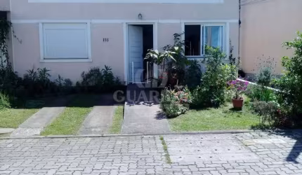 Casa em condomínio fechado com 1 quarto à venda na Rua Capitão Pedroso, 416, Restinga, Porto Alegre por R$ 205.000