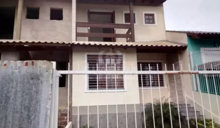 Casa com 3 quartos à venda na Rua Itacyr Rossi, 10, Guarujá, Porto Alegre por R$ 490.000