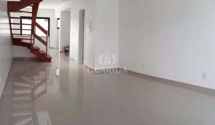 Casa com 2 quartos à venda na Rua Heitor Kramer, 700, Guarujá, Porto Alegre por R$ 465.000