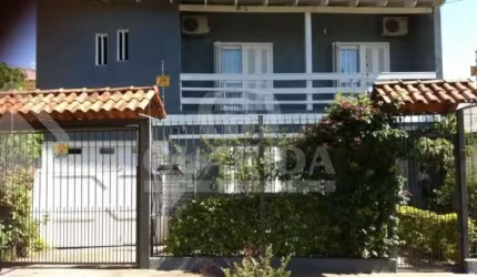 Casa com 4 quartos à venda na Rua Giruá, 63, Cavalhada, Porto Alegre por R$ 990.000
