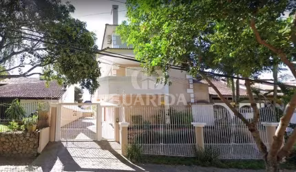 Casa em condomínio fechado com 3 quartos à venda na Rua Doutor Guilherme Schultz Filho, 80, Jardim Isabel, Porto Alegre por R$ 850.000