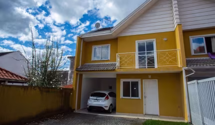 Sobrado com 3 dormitórios à venda, 120 m² por R$ 650.000,00 - Atuba - Curitiba/PR