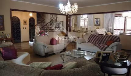 Casa em condomínio fechado com 3 quartos para alugar na Rua Assunção, 195, Jardim Lindóia, Porto Alegre, 375 m2 por R$ 10.000