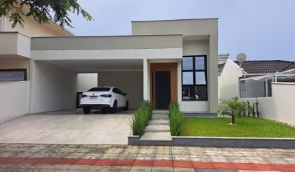 Casa em condomínio fechado com 3 quartos à venda na Rua Monte Cambirela, 455, Praia de Fora, Palhoça, 137 m2 por R$ 990.000