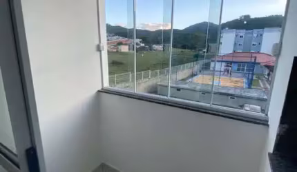 Apartamento com 2 quartos à venda na Rua Homero de Miranda Gomes, 1197, Fundos, Biguaçu, 51 m2 por R$ 247.000