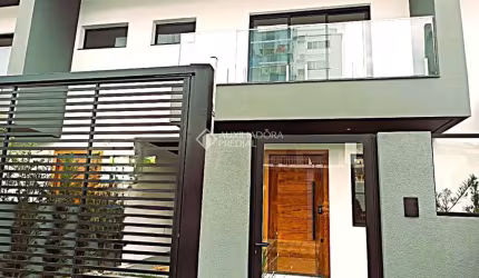 Casa com 3 quartos à venda na Rua Verona, 2, Pagani, Palhoça, 121 m2 por R$ 830.000