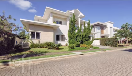 Casa em condomínio fechado com 4 quartos à venda na Rodovia Doutor Antônio Luiz Moura Gonzaga, 3825, Rio Tavares, Florianópolis, 328 m2 por R$ 4.999.000