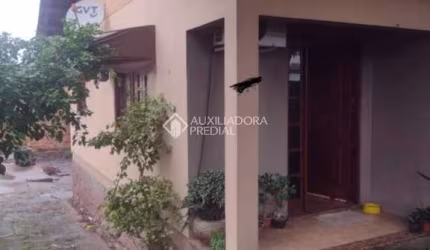 Casa com 2 quartos à venda na Caiapó, 115, Vila Monte Carlo, Cachoeirinha, 100 m2 por R$ 480.000