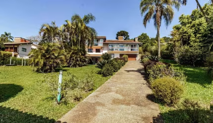 Casa em condomínio fechado com 4 quartos à venda na Rua da Amizade, 76, Barro Vermelho, Gravataí, 450 m2 por R$ 2.500.000