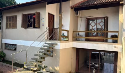 Casa com 3 quartos à venda na Santa Luzia, 77, Passos dos Ferreiros, Gravataí, 200 m2 por R$ 889.000