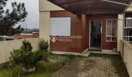 Casa em condomínio fechado com 2 quartos à venda na Rua Porto Alegre, 670, Mato Alto, Gravataí, 65 m2 por R$ 350.000