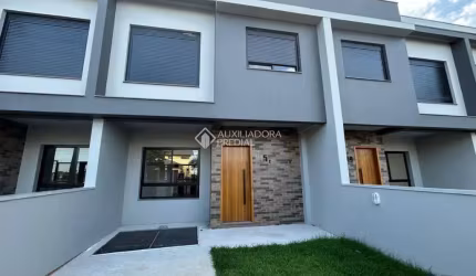 Casa com 3 quartos à venda na Euclides Linck, 253, Oriço, Gravataí, 80 m2 por R$ 449.000