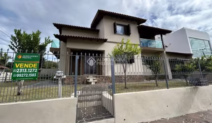 Casa com 4 quartos à venda na Jaqueline, 327, Jansen, Gravataí, 200 m2 por R$ 690.000