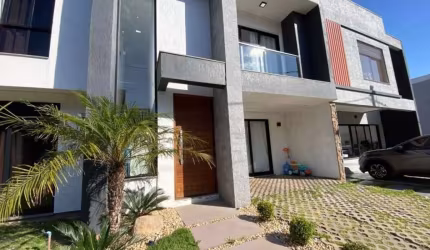 Casa em condomínio fechado com 3 quartos para alugar na Rua Tancredo Neves, 990, Jansen, Gravataí, 118 m2 por R$ 6.500