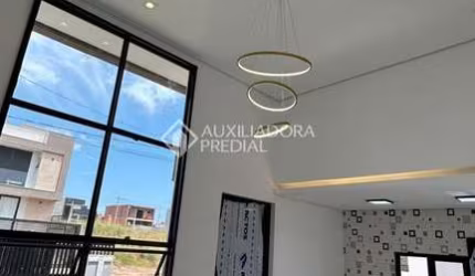Casa com 3 quartos para alugar na Otelvino Soster, 78, Morada do Vale II, Gravataí, 83 m2 por R$ 4.500