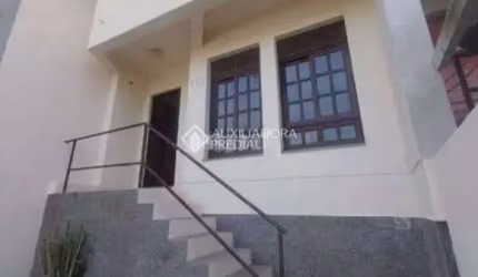 Casa com 3 quartos para alugar na Rua João Carlos Linck, 106, Loteamento Jardim Timbaúva, Gravataí, 94 m2 por R$ 3.100