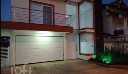 Casa em condomínio fechado com 4 quartos para alugar na Rua Antônio Baggio, 40, Loteamento Jardim Timbaúva, Gravataí, 180 m2 por R$ 7.150