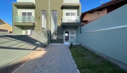 Casa com 3 quartos à venda na Euclides Linck, 214, Oriço, Gravataí, 100 m2 por R$ 549.900