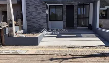 Casa em condomínio fechado com 3 quartos à venda na Rua das Camélias, 329, Parque da Matriz, Gravataí, 90 m2 por R$ 700.000