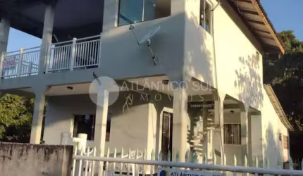 Casa no Litoral com 2 quartos, 1 suite, 2 salas 2 cozinhas, garagem